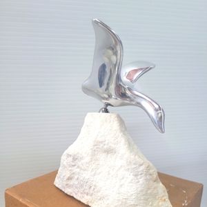Vintage Hoselton Sculpture Duck in Flight White Marble base.